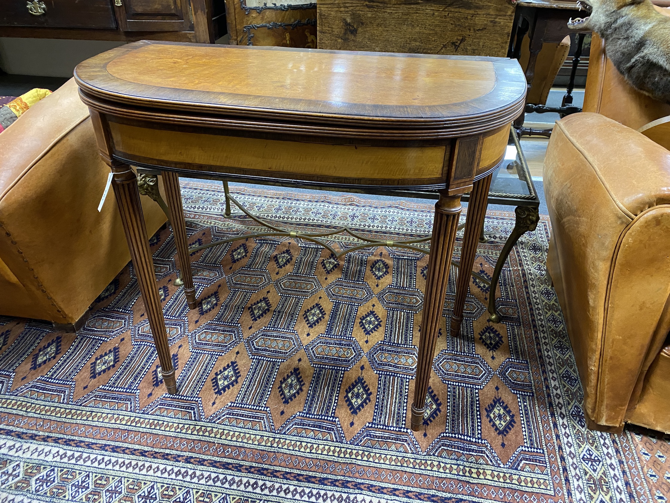 A George III rosewood banded satinwood D shaped card table width 82cm, width 43cm height 74cm